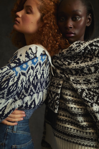 Two models wearing Fair Isle sweaters